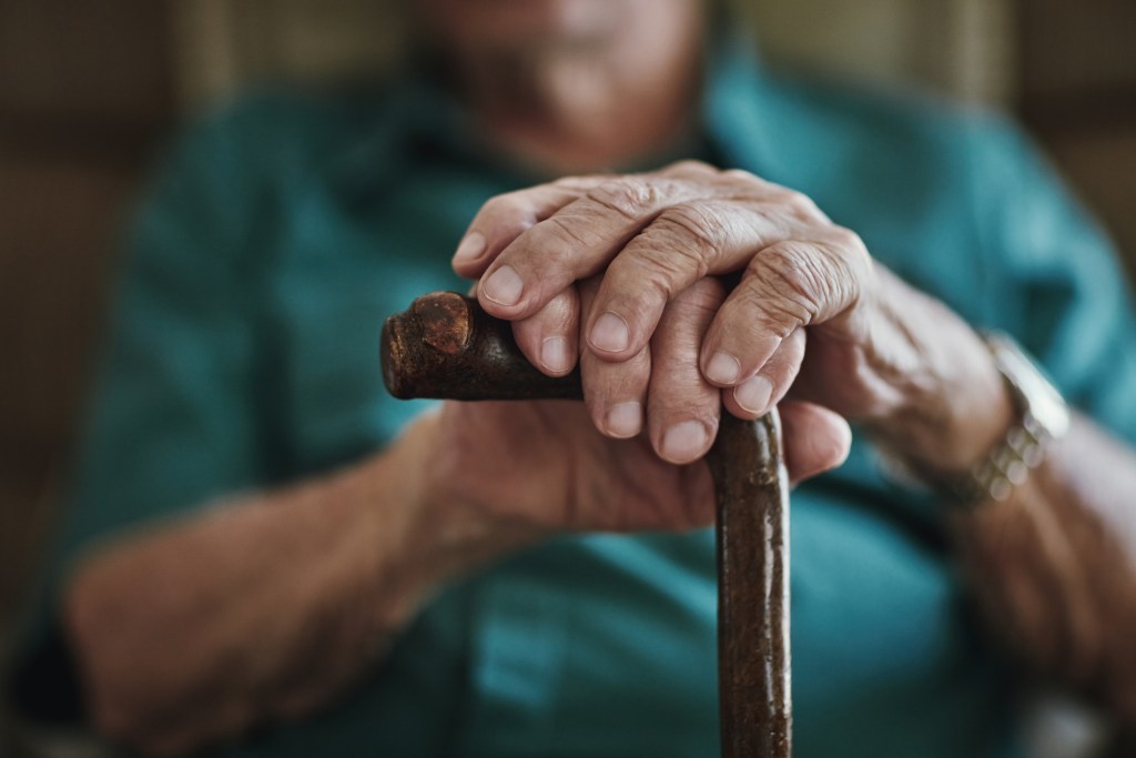 Peripheral vascular access of elderly patients - What are the available options - Cropped shot of an unrecognizable man leaning on his walking stick